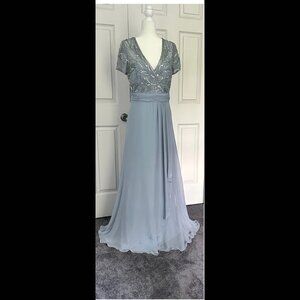 Xscape Brand Gown with sheer Bodice in Back. size 16